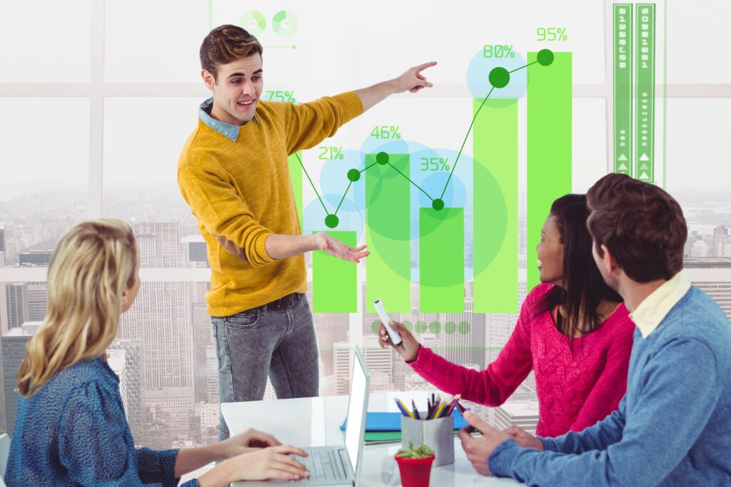 Marketing team analyzing growth charts and performance metrics during a business strategy presentation.
